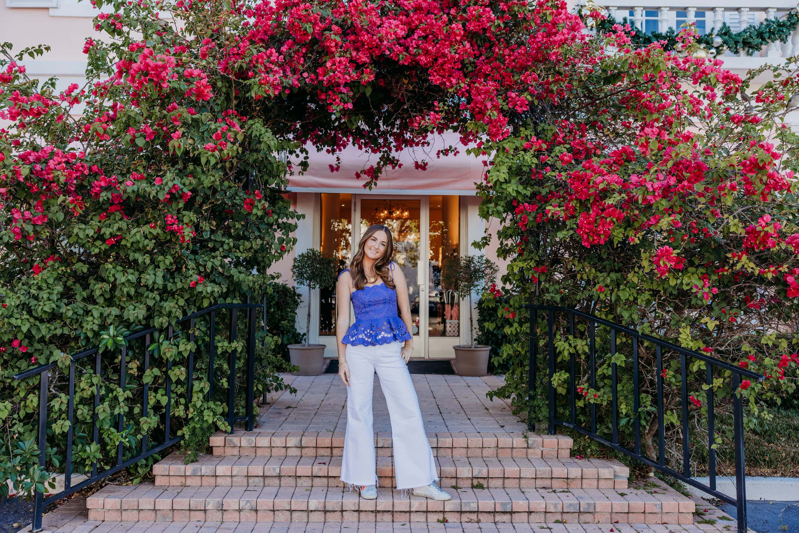Naples senior portrait with flowers by photographer Kelly Jones